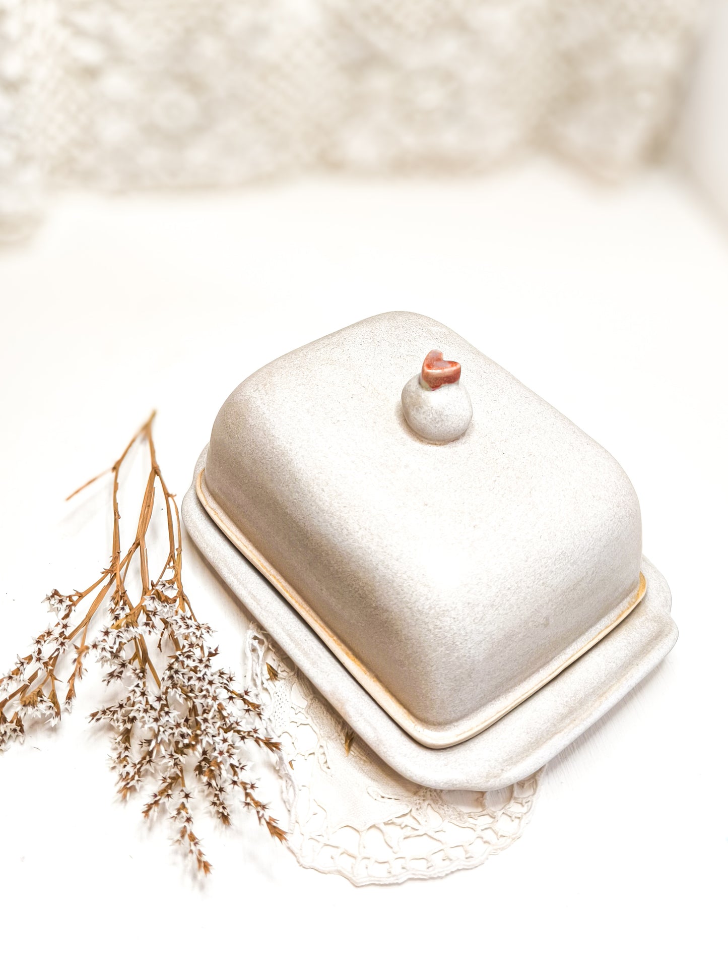 Ceramic butter dish with a heart motif