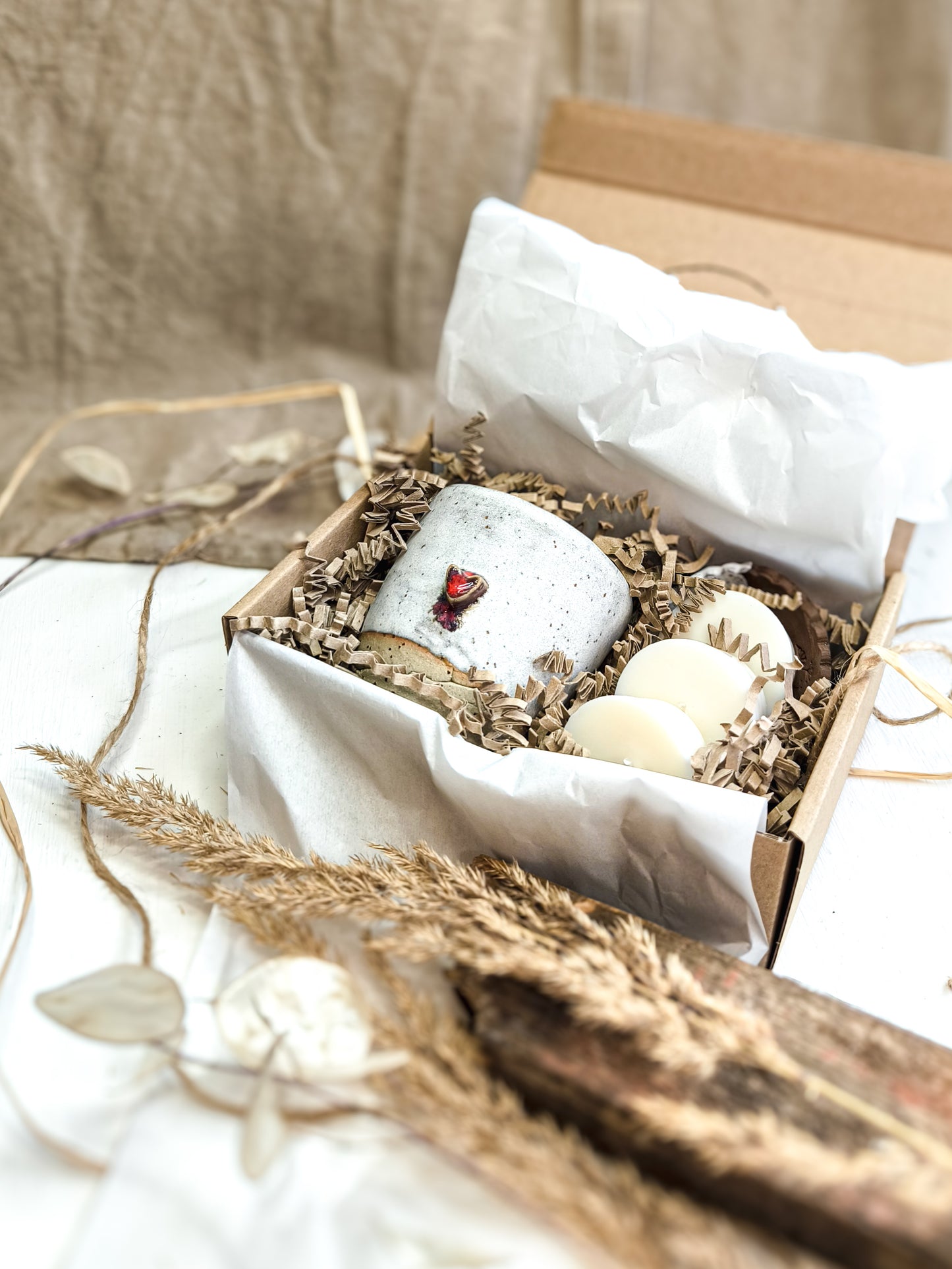 Love box with ceramic espresso cup with a heart and tealights