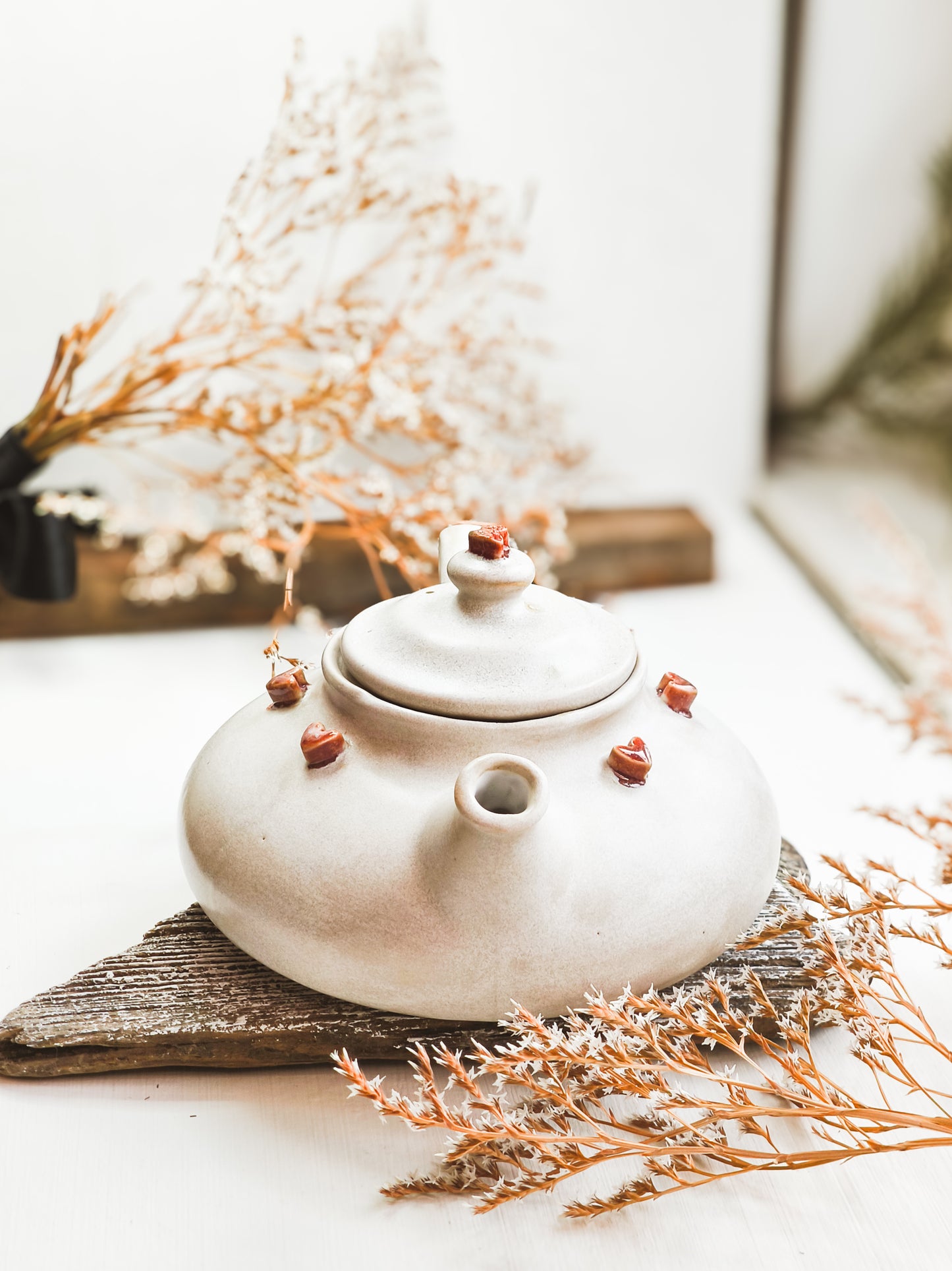Ceramic teapot with a heart motif