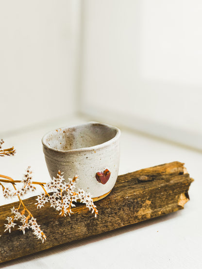 Ceramic espresso cup with a heart