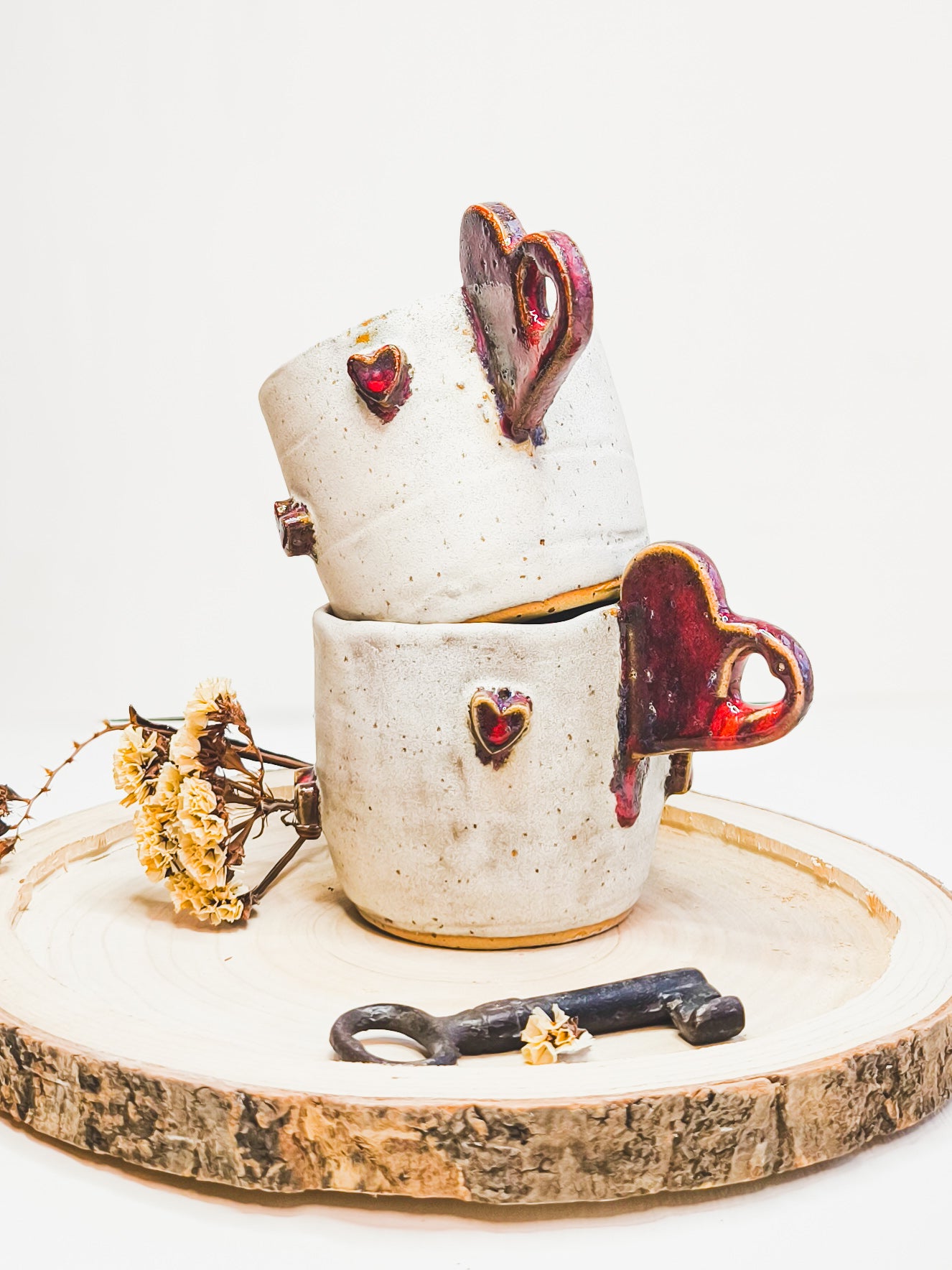 Ceramic coffee or tea mug with a 3D hearts and heart-shaped handle